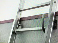 Wall-mounted ladder hook