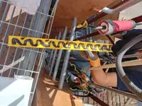 Non-slip covers for fixed or portable ladder rungs