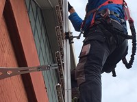 Fixed ladder with rail and fall protection