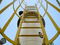 Non-slip covers for fixed or portable ladder rungs