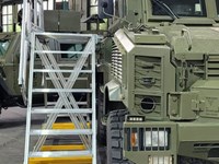 Telescopic ladder for access to containers