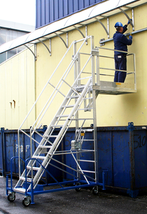 Telescopic platform ladder with outreach