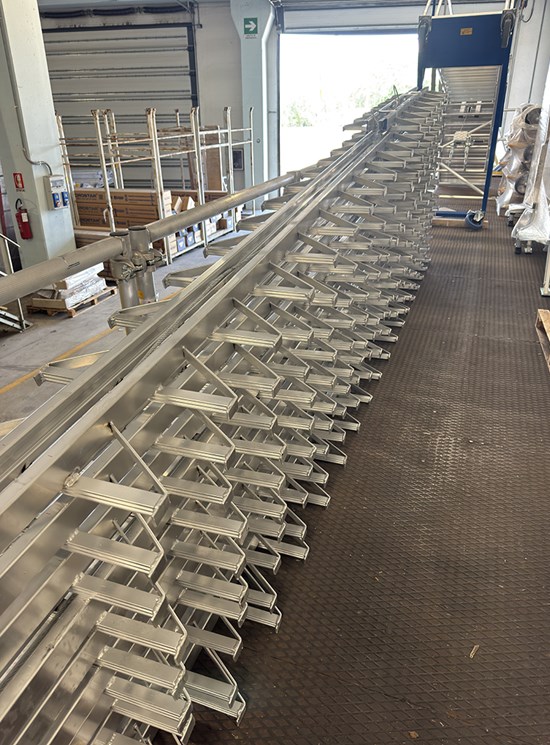 Fixed ladder with rail and fall protection